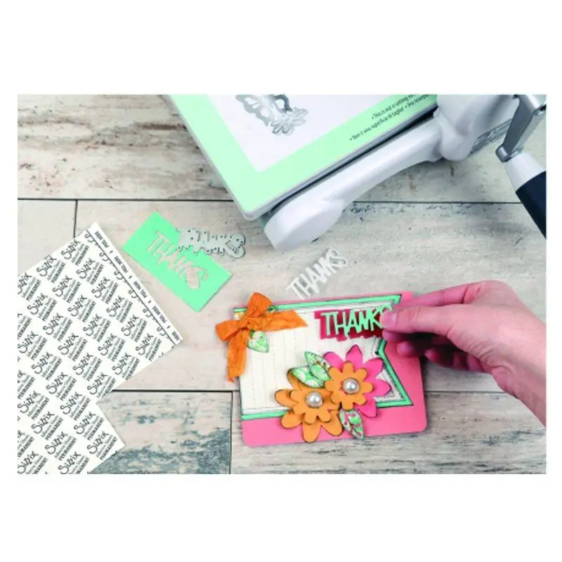 SIZZIX obojstranne lepiaca transparentná fólia 10ks /15x15cm/