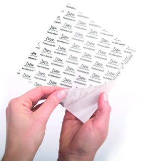 SIZZIX obojstranne lepiaca transparentná fólia 10ks /15x15cm/